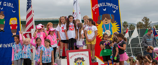 Girls sport competition in Ventura County Girls have fun competing and standing on the podium at Brownilympics